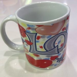 LOVE wrap around ceramic cup/mug.Standard 8 oz size. Microwave/dishwasher safe.